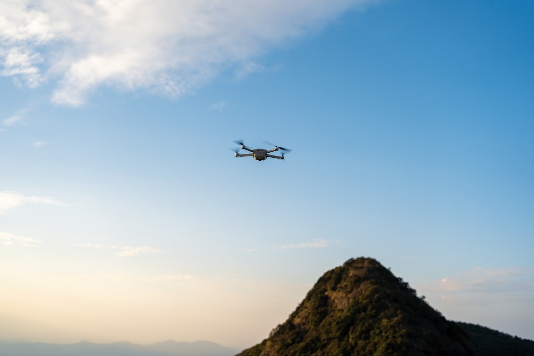 drone flying over mountains