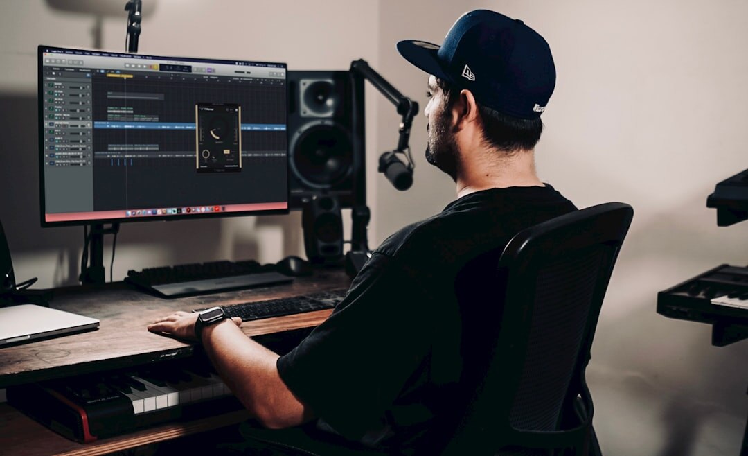 video editor working on computer
